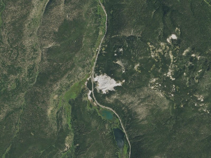 Aerial view of the ground around Steam Vents At Roaring Mountain