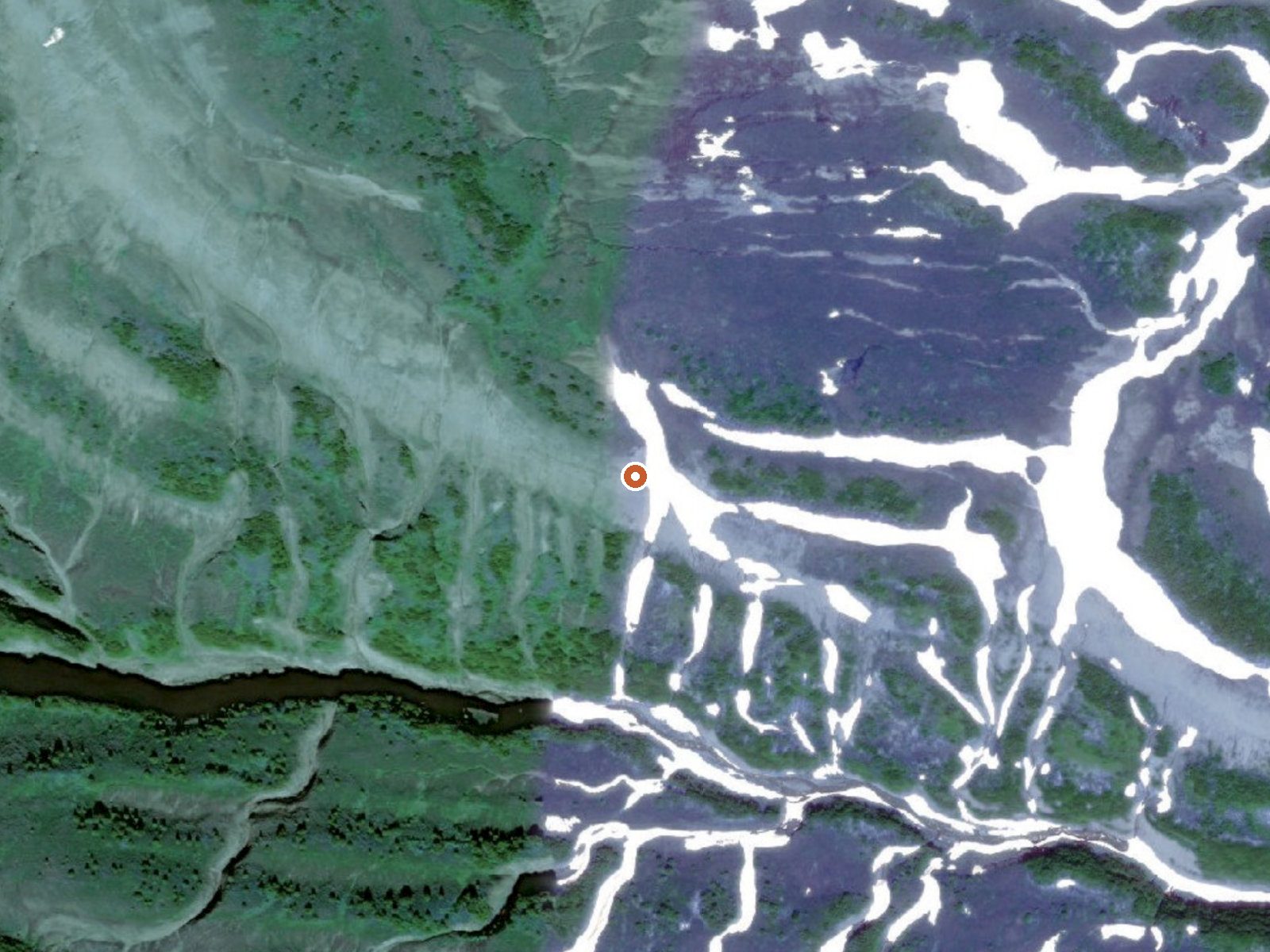 Aerial view of the ground around Hot Spring West Of Cape Douglas