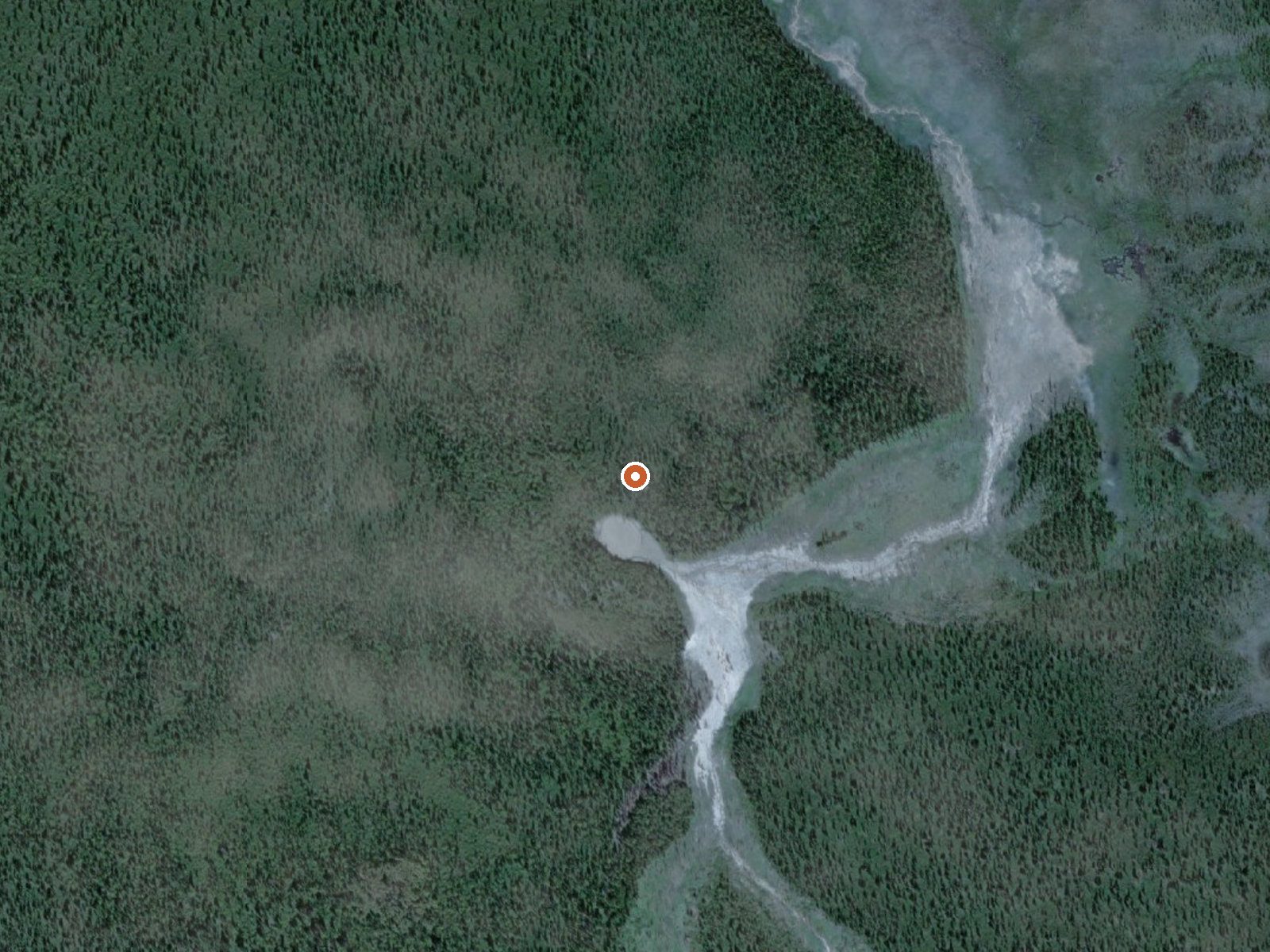 Aerial view of the ground around Upper Klawasi Warm Springs