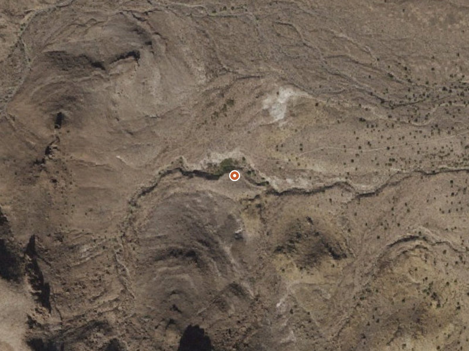 Aerial view of the ground around Caliche Spring