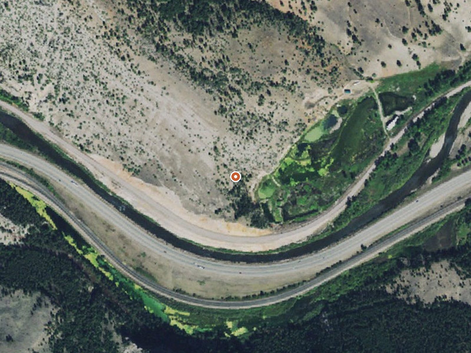Aerial view of the ground around Bearmouth Warm Spring 2