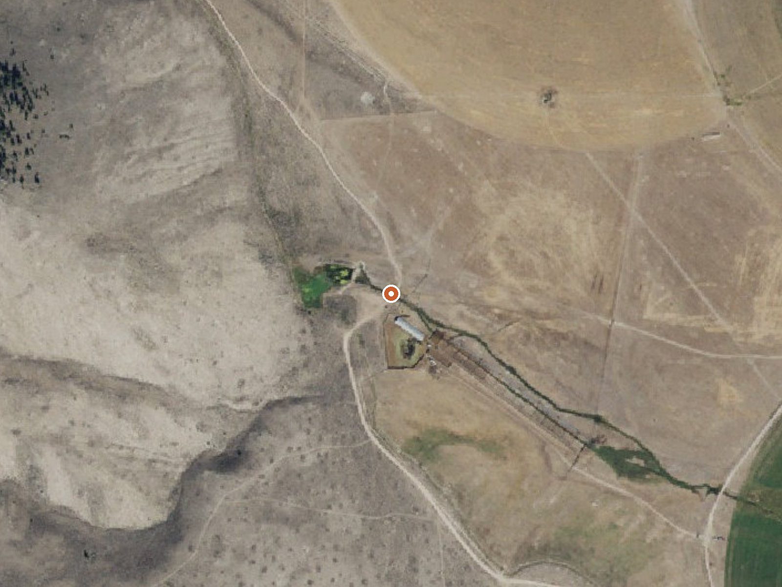 Aerial view of the ground around Whittaker Warm Springs