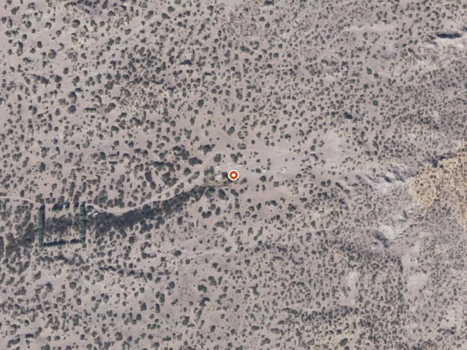 Aerial view of the ground around Hot Well Dunes