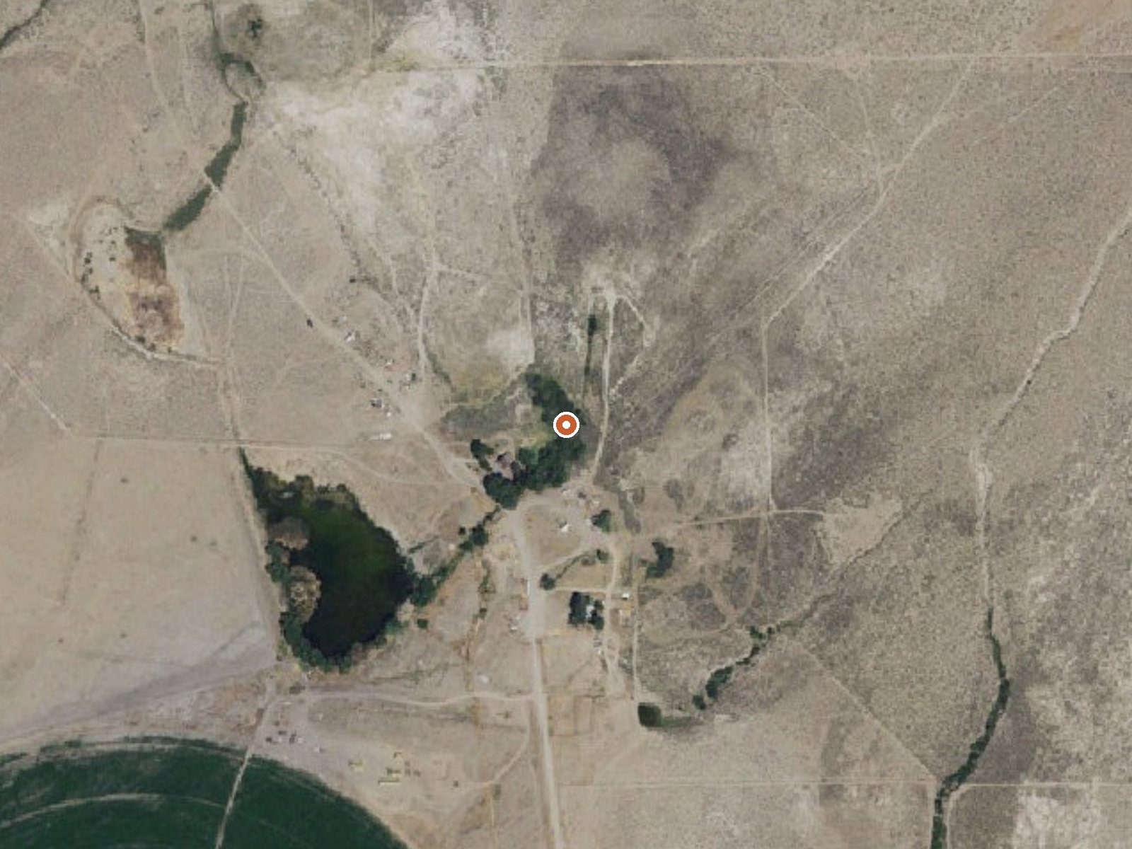 Aerial view of the ground around Bertrand Ranch Springs
