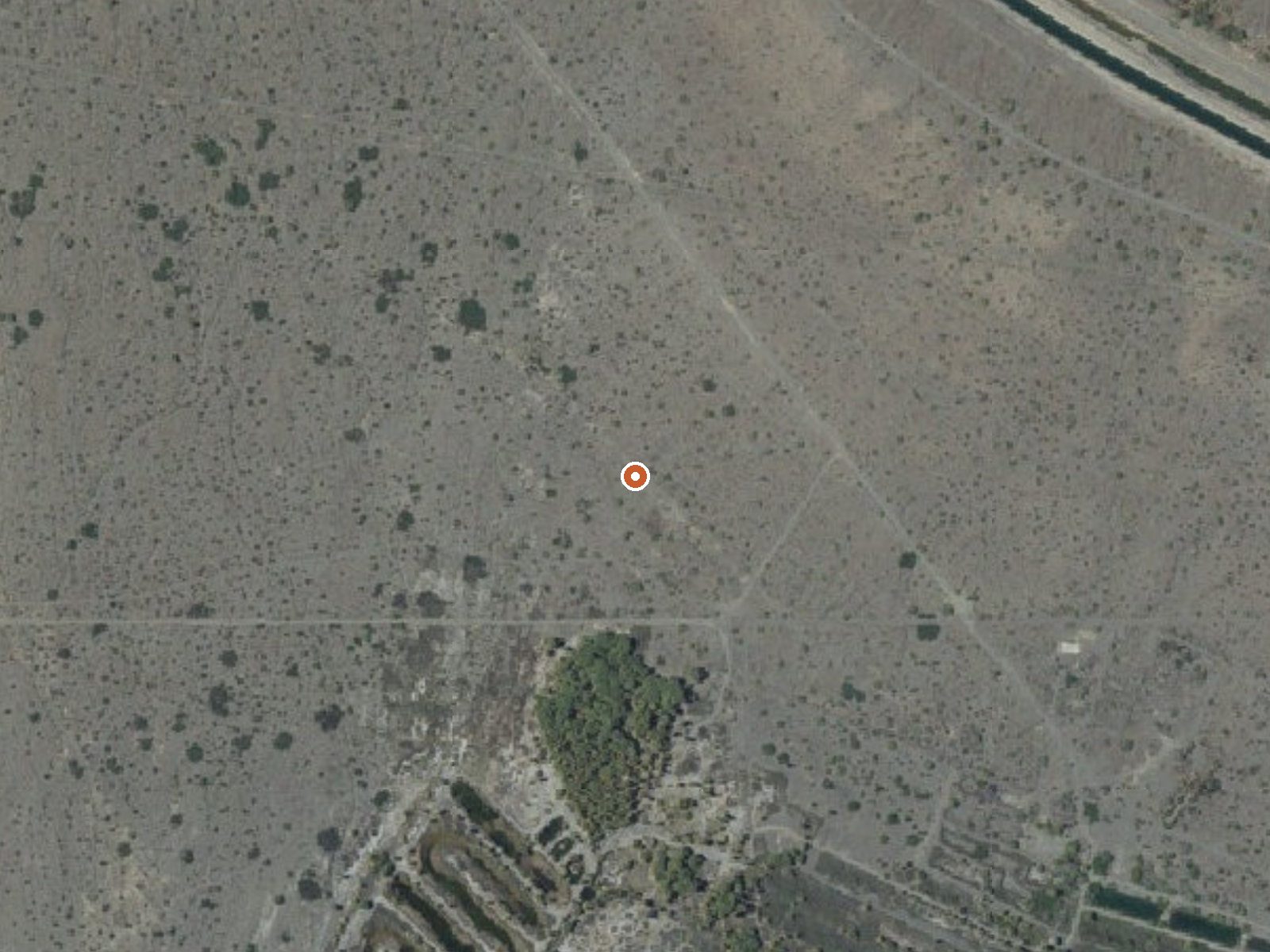 Aerial view of the ground around Dos Palmas Spring