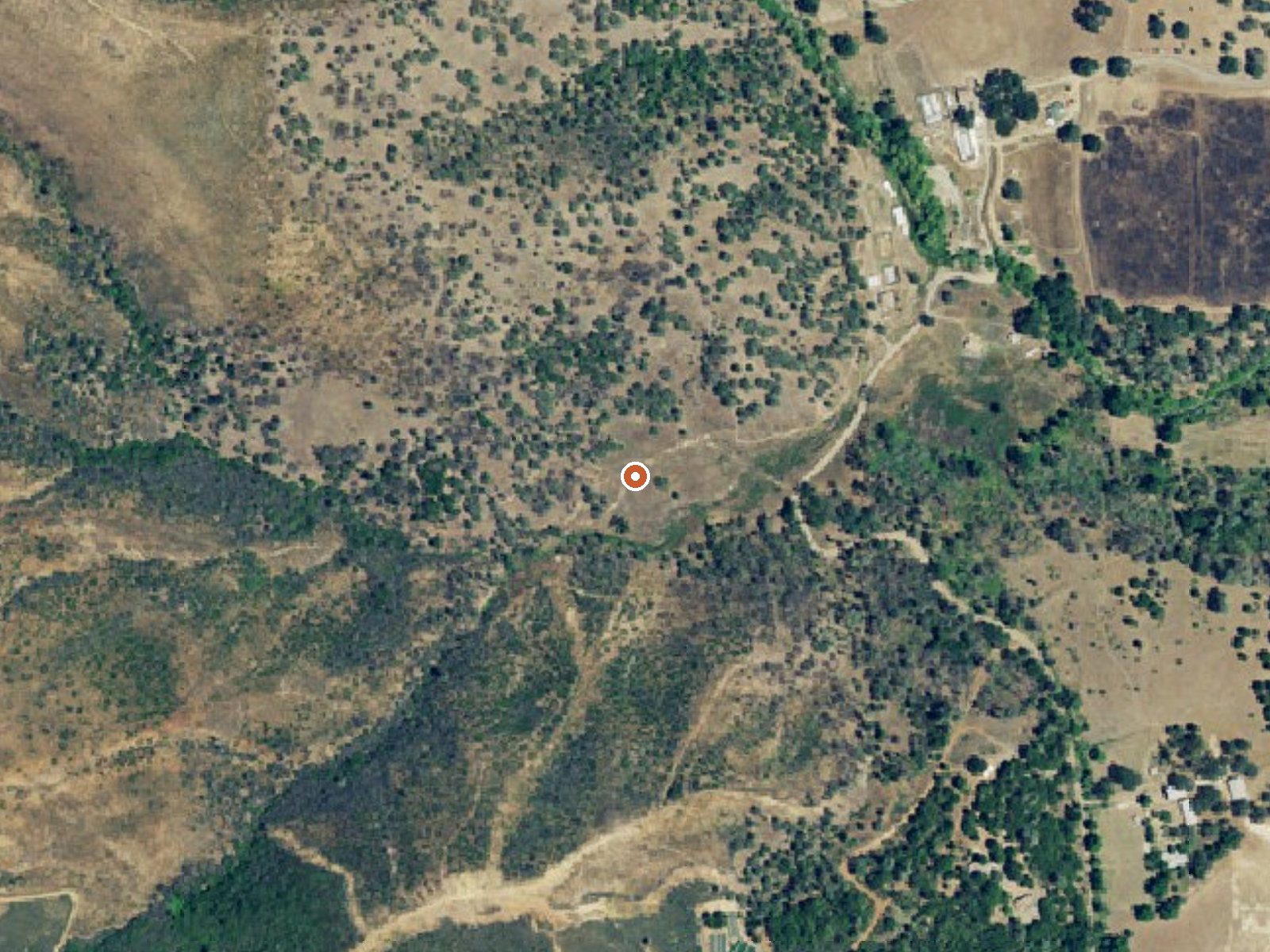 Aerial view of the ground around Quigley Soda Spring