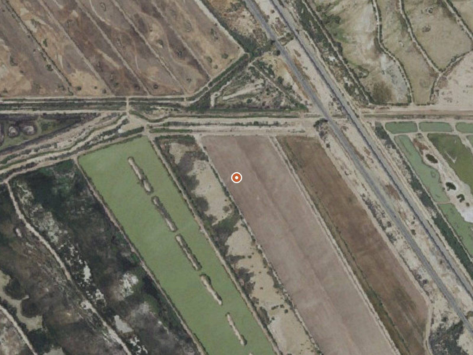 Aerial view of the ground around Mud Volcanoes