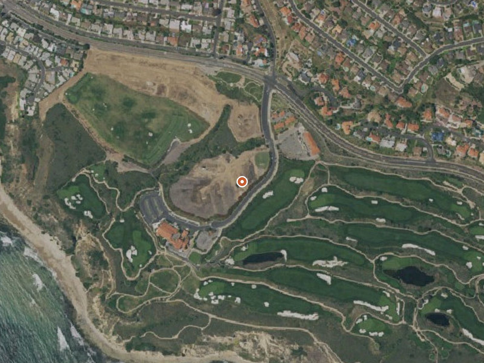 Aerial view of the ground around Whites Point Hot Springs