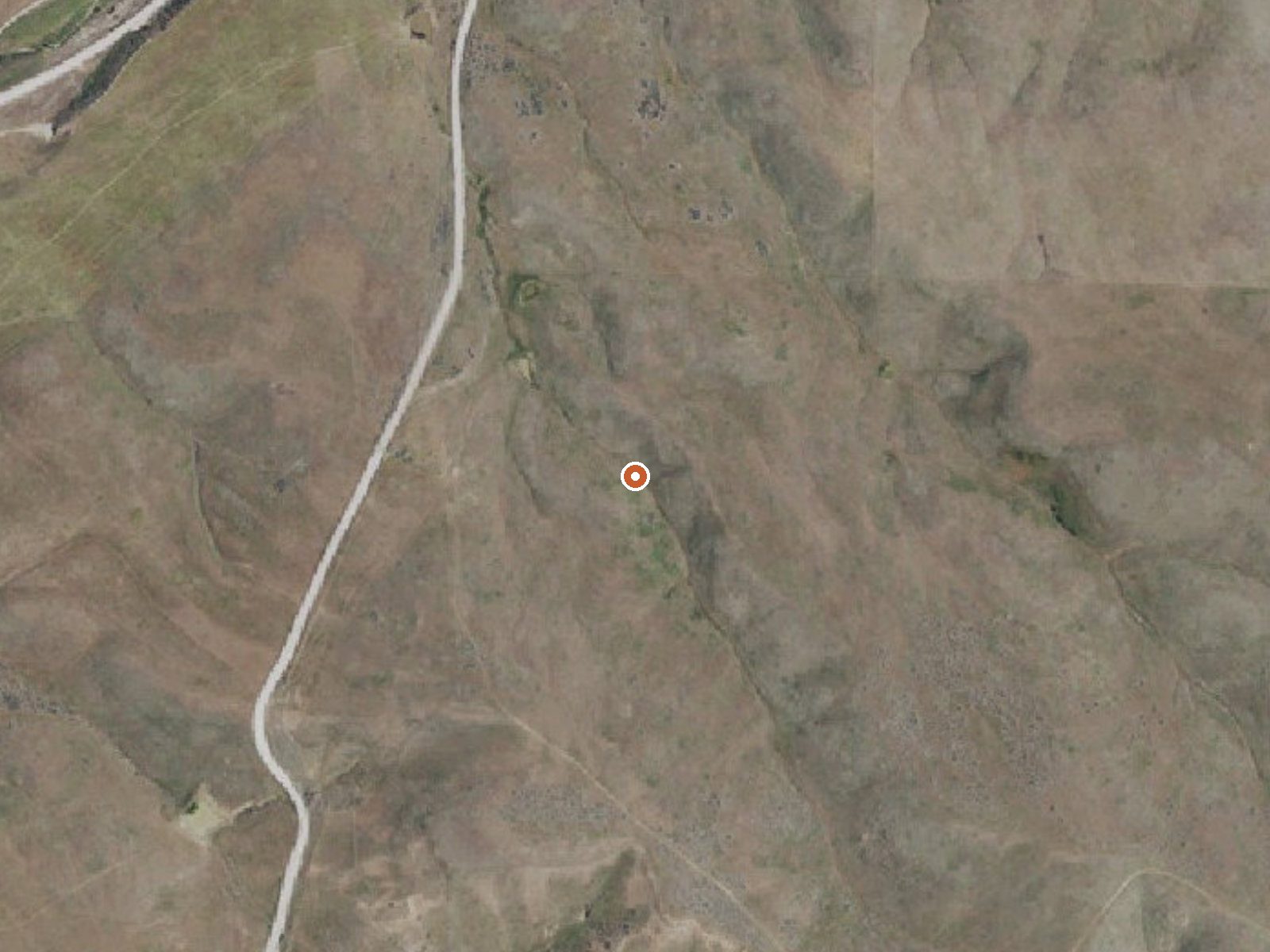 Aerial view of the ground around Highland Land Co Warm Spring