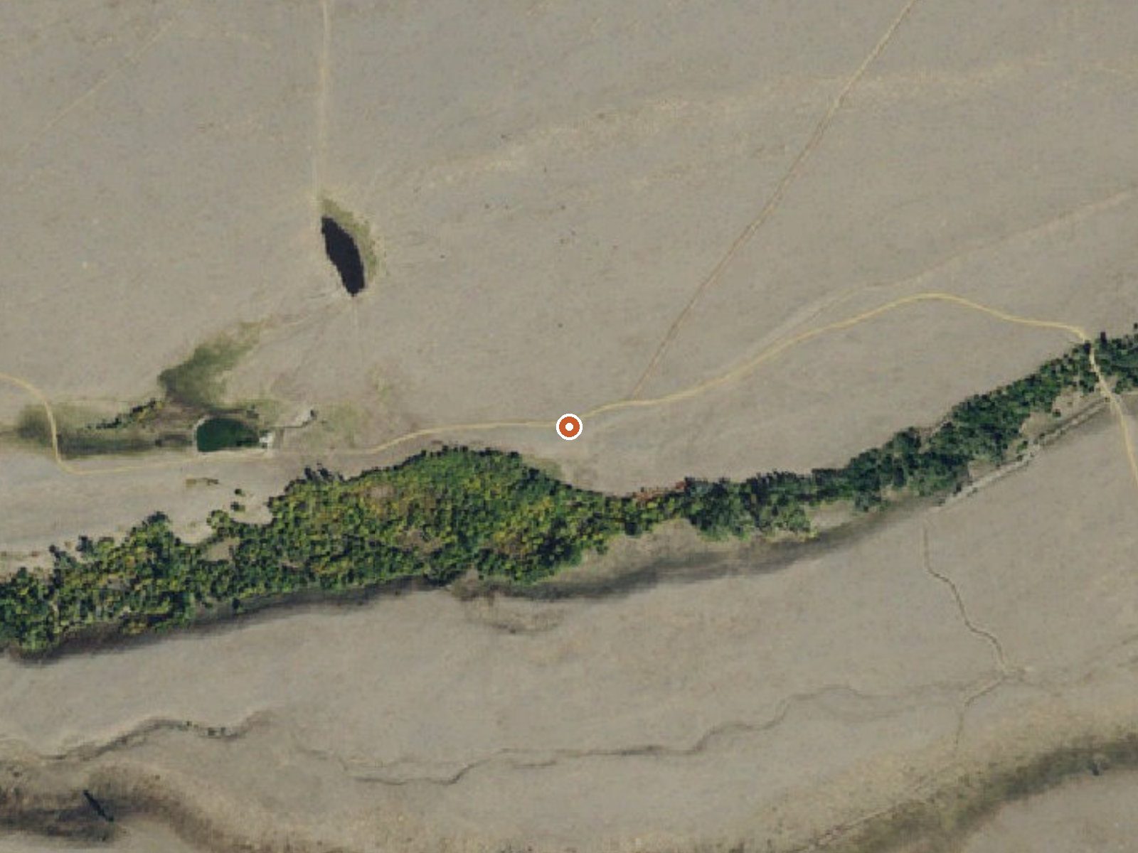 Aerial view of the ground around Wolf Creek Hot Springs