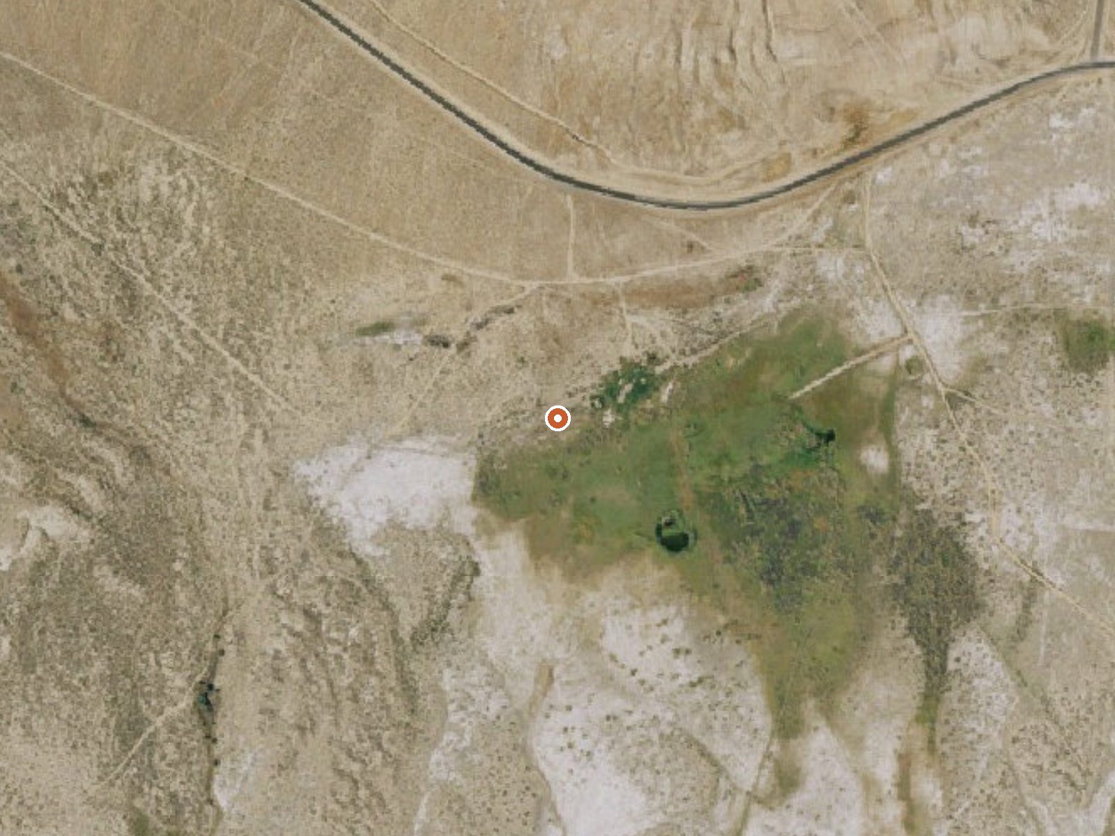 Aerial view of the ground around Mud Springs