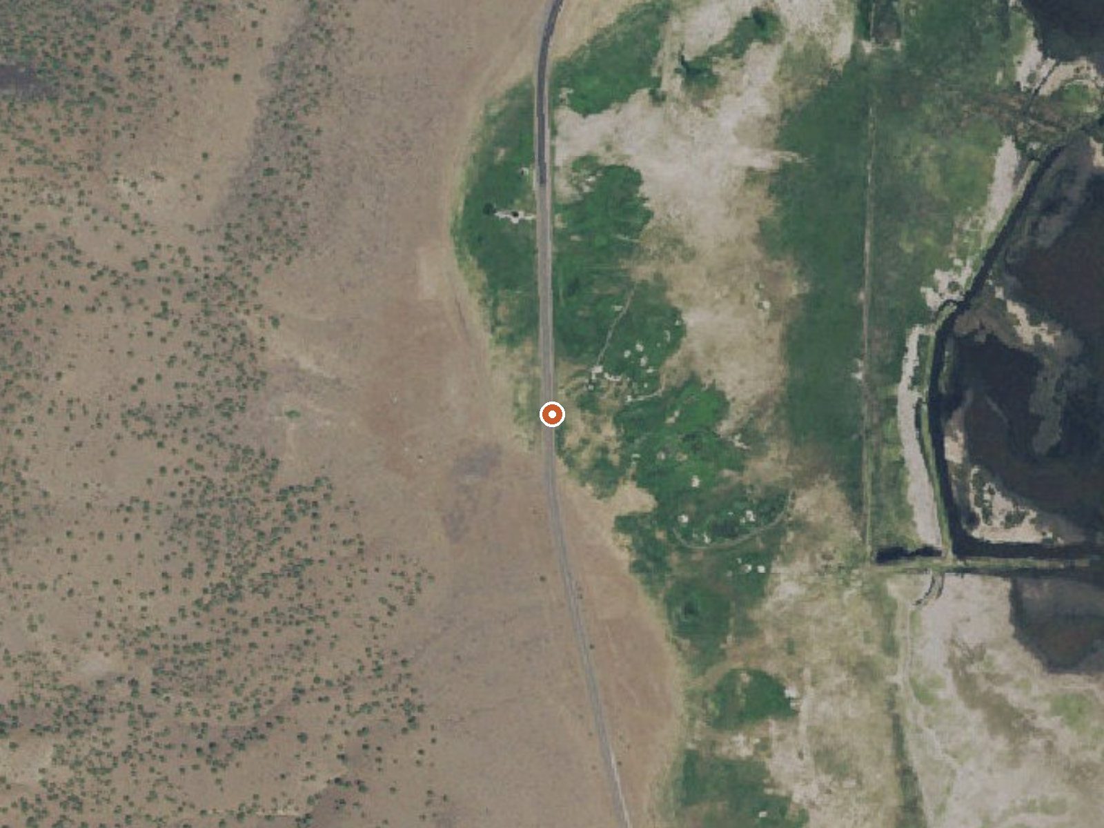 Aerial view of the ground around Crump Geyser (Crump Spring)