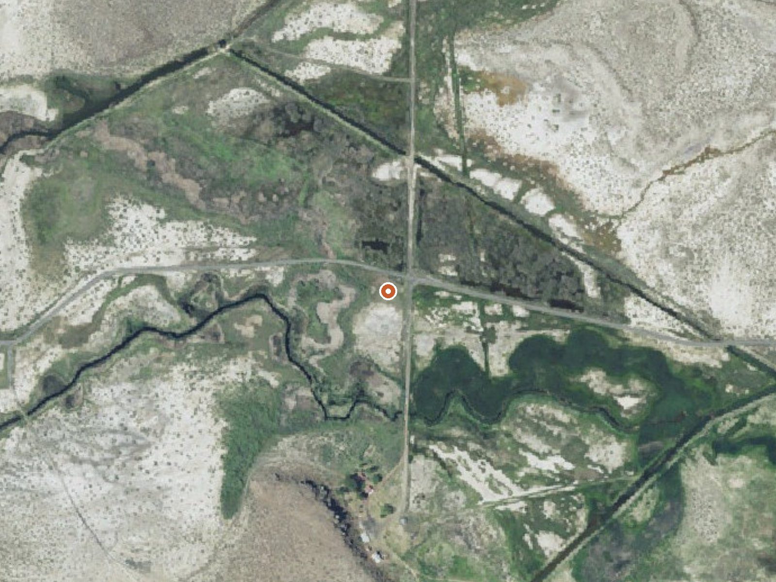 Aerial view of the ground around Double O Barnyard Spring