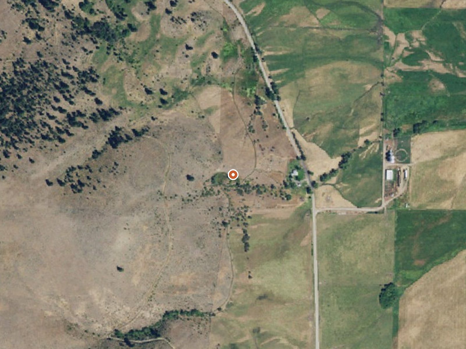 Aerial view of the ground around Fisher Hot Springs
