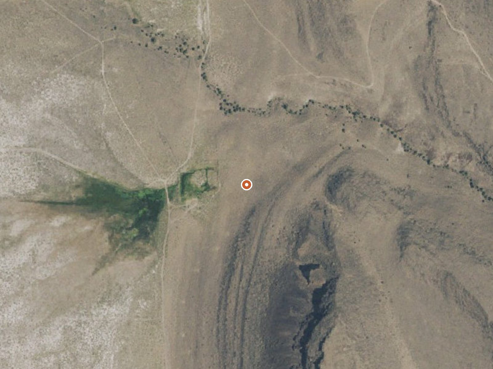 Aerial view of the ground around Fisher Hot Springs