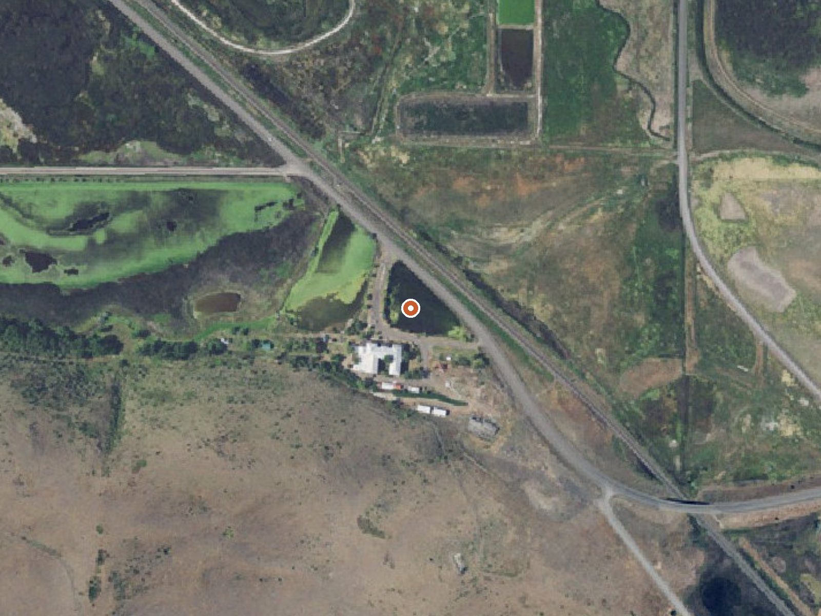 Aerial view of the ground around Hot Lake Springs
