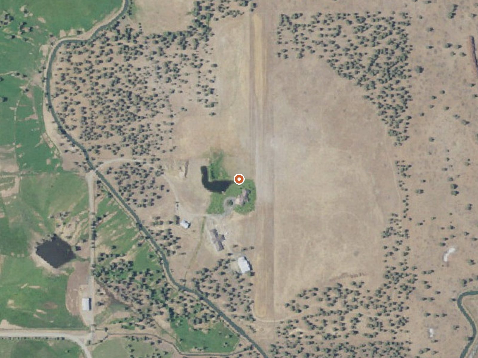 Aerial view of the ground around Wilkersons Hot Spring
