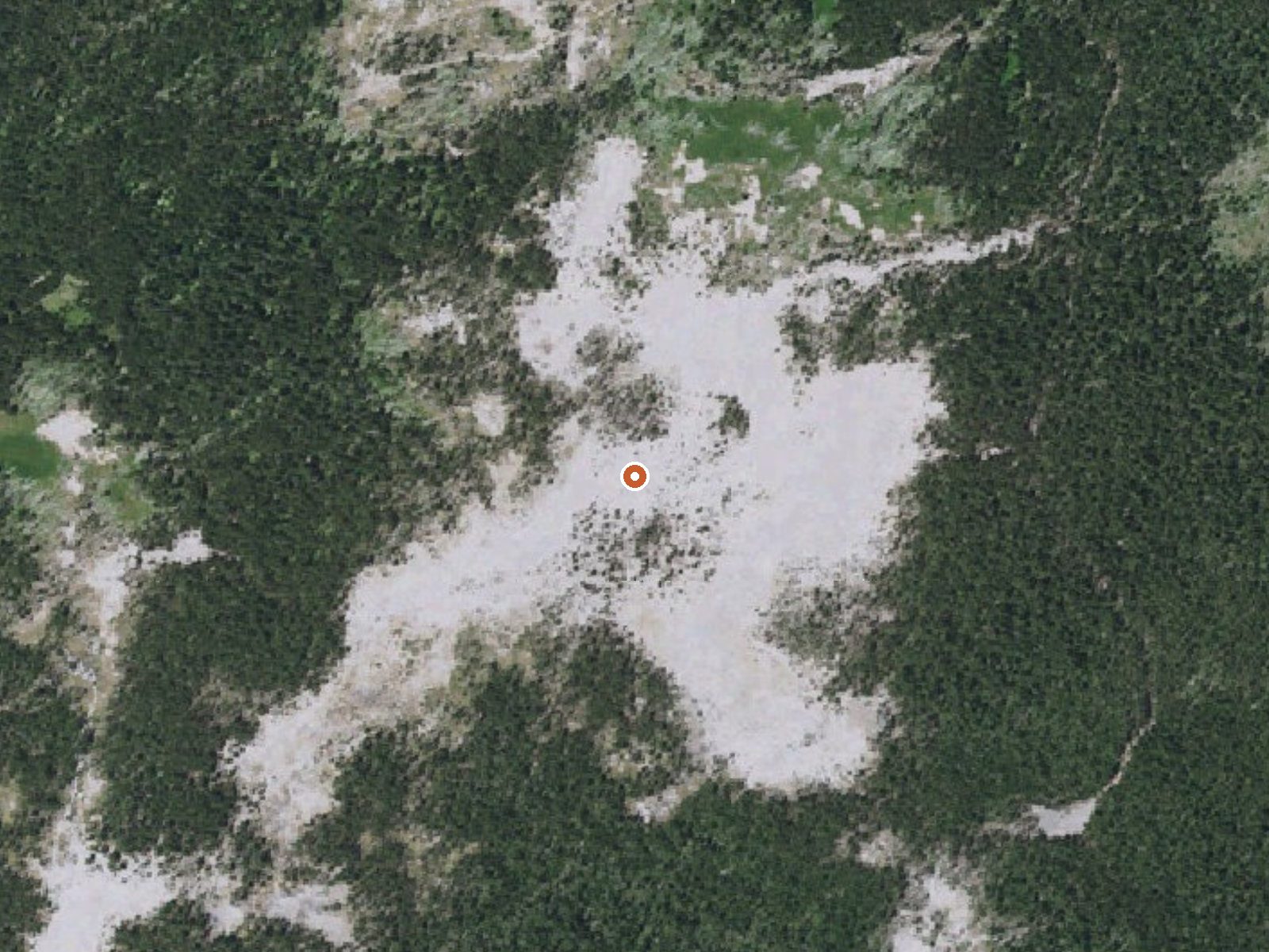 Aerial view of the ground around Hot Springs East Of Mary Lake