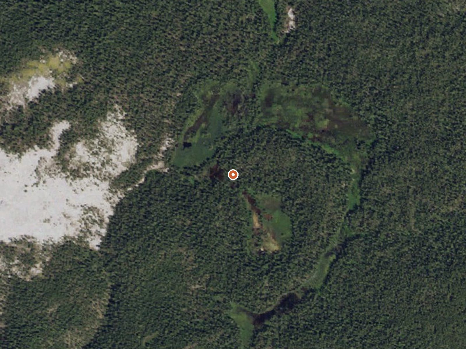 Aerial view of the ground around Hot Springs On Bog Creek
